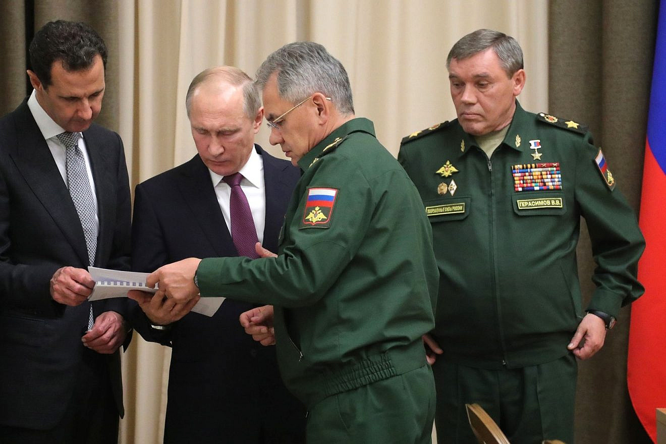 Syrian President Bashar Assad (left) and Russian President Vladimir Putin with defense leaders in November 2017. Credit: Kremlin.ru via Wikimedia Commons.