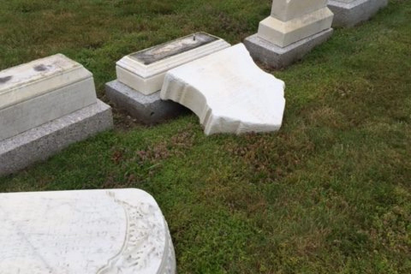 The desecrated headstones found in July 2017 at the historic Netherlands Cemetery in Melrose, Mass. Credit: Melrose Police Department.