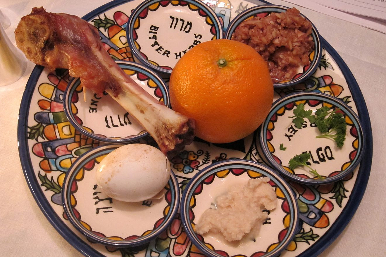 A Passover seder plate featuring an orange, which was added several years ago by some as a symbol of women’s rights or to represent the gay and lesbian community.