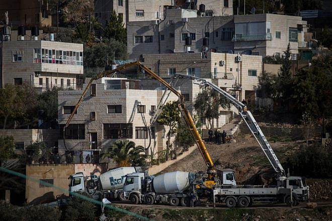 Israeli security forces have wrecked or sealed with cement homes of known terrorists, such as the house of Ala Abu Jamal in the eastern Jerusalem neighborhood of Jabel Mukabar on Jan. 4, 2015, as part of retribution for terror attacks. Photo by Hadas Parush/Flash90.