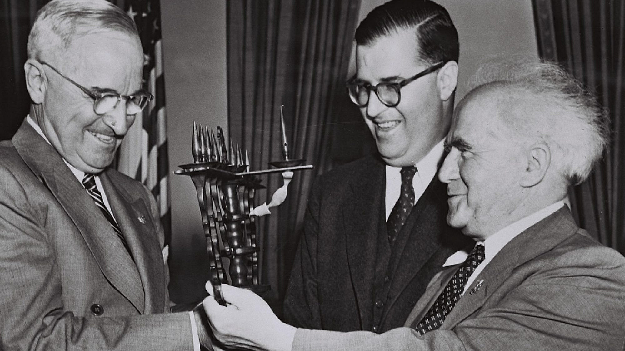U.S. President Harry S. Truman, Israeli Ambassador to the United States Abba Eban and Israeli Prime Minister David Ben-Gurion in the White House on May 1, 1951. The Israeli leaders presented Truman with a menorah. Credit: Fritz Cohen via Wikimedia Commons.