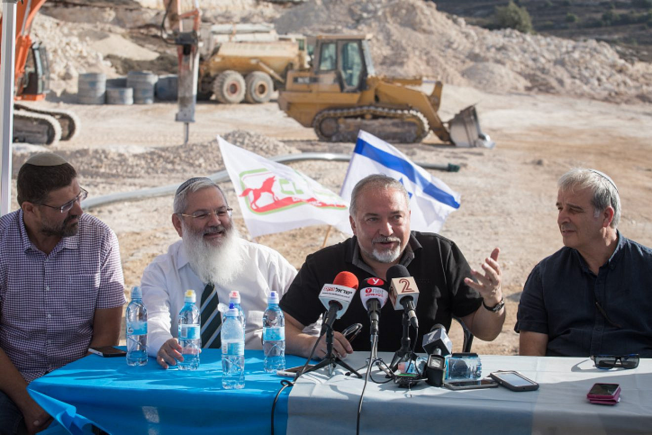 Israeli minister of Defense Avigdor Lieberman visits construction of the new Israeli settlement Amichai, established as the new home for the evacuated residents of Amona, on Oct. 18, 2017. Photo by Hadas Parush/Flash90.