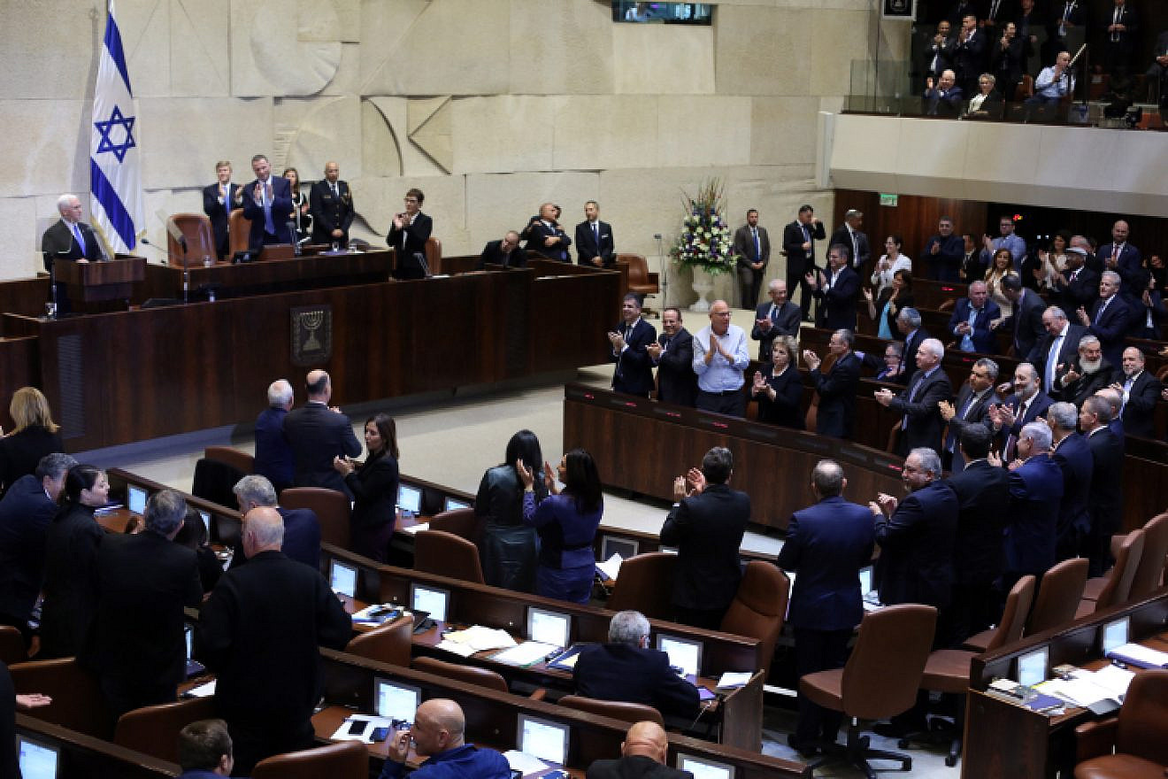 Knesset Members applaud as U.S. Vice President Mike Pence speaks at the special plenary session at the Knesset, Israel's Parliament, in Jerusalem, on Jan. 22, 2018. Photo by Gil Yochanan/POOL