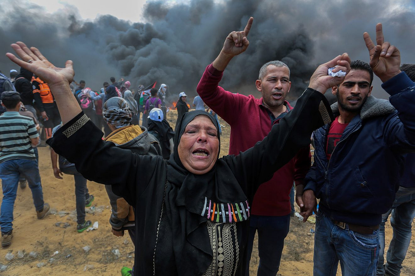 Palestinian protesters during clashes with Israeli forces near the Gaza-Israel border in Rafah, Gaza, on May 14, 2018. Photo by Abed Rahim Khatib/Flash90.