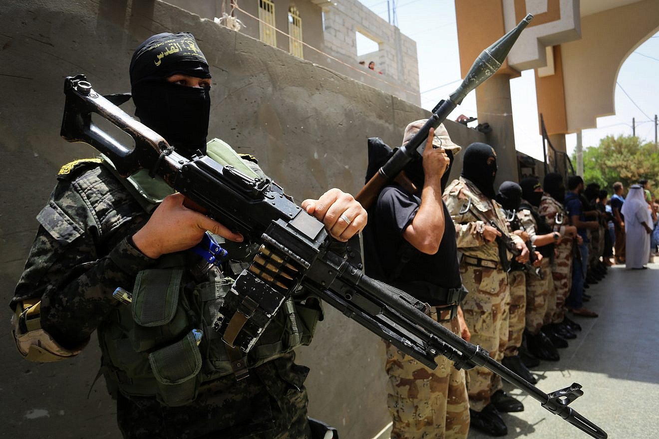 Islamic Jihad militants guard outside the funeral of Islamic Jihad militant Hussein al-Amour, who was killed during an Israeli airstrike in southern Gaza on May 27, 2018. Photo by Abed Rahim Khatib/Flash90.