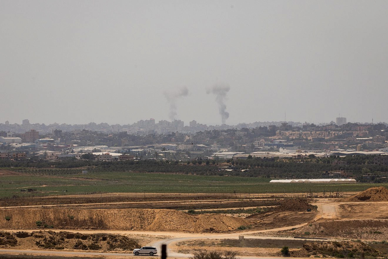 Smoke rises following an Israeli attack on the Gaza Strip as it seen from the Israeli side of the border on May 29, 2018. Photo by Yonatan Sindel/Flash90.