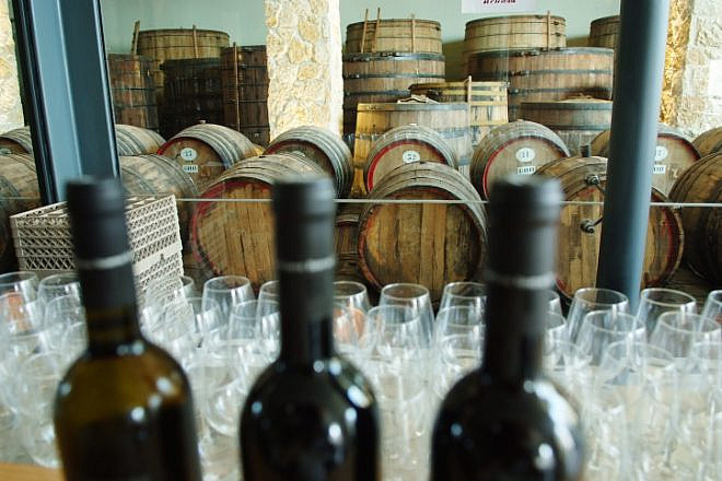 Wine barrels piled up at the Barkan winery. Aug. 2, 2012. Photo by Mendy Hechtman/Flash90.