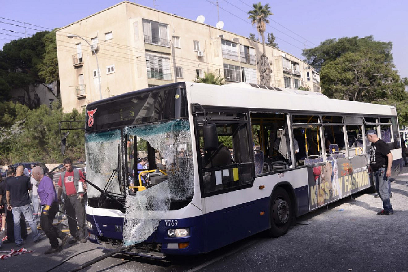 Israeli police and rescue personnel at the scene of a bombing on a Tel Aviv passenger bus on Nov. 21 2012 . Photo by Tomer Neuberg/ Flash90.