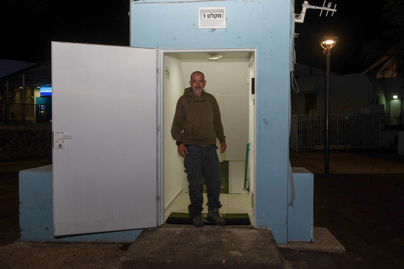 A man seen at the entrance to a bomb shelter in the Golan Heights in northern Israel on May 8, 2018, following an Israeli-army order to open area bomb shelters. Photo by Basel Awidat/Flash90.