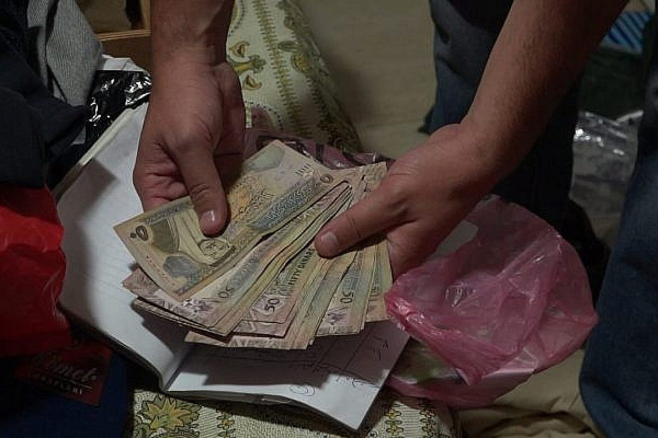 Some of the confiscated money. Source: Israel Police.