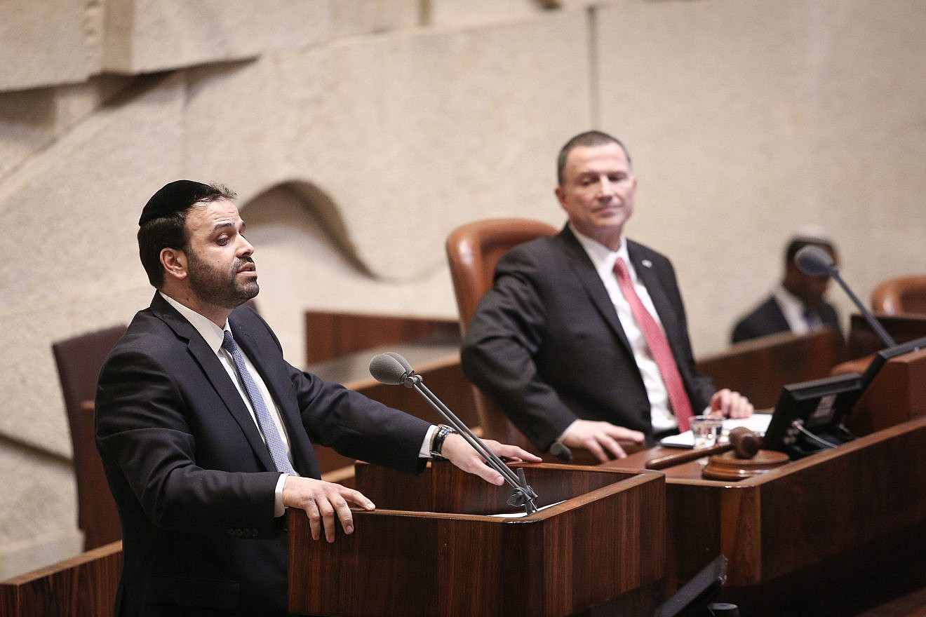 Yinon Azoulay of the Shas Party at the Knesset assembly hall during his swearing-in as a member of the Israeli parliament in Jerusalem on March 14, 2018. Photo by Yonatan Sindel/Flash90.