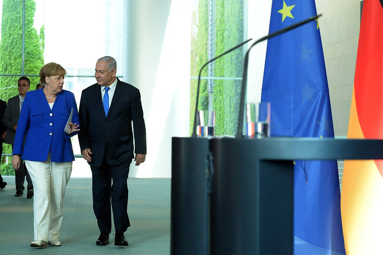 Israeli Prime Minister Benjamin Netanyahu and German Chancellor Angela Merkel at a joint press conference in Berlin on June 4, 2018. Photo by Haim Zach/GPO.
