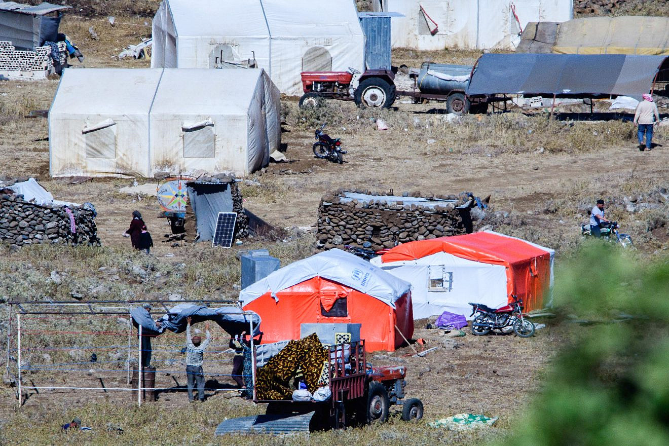 View of a tent camp of Syrian refugees near the Syrian village of Burayqah as it seen from the Israeli side of the border on July 1, 2018. Photo by Basel Awidat/Flash90.