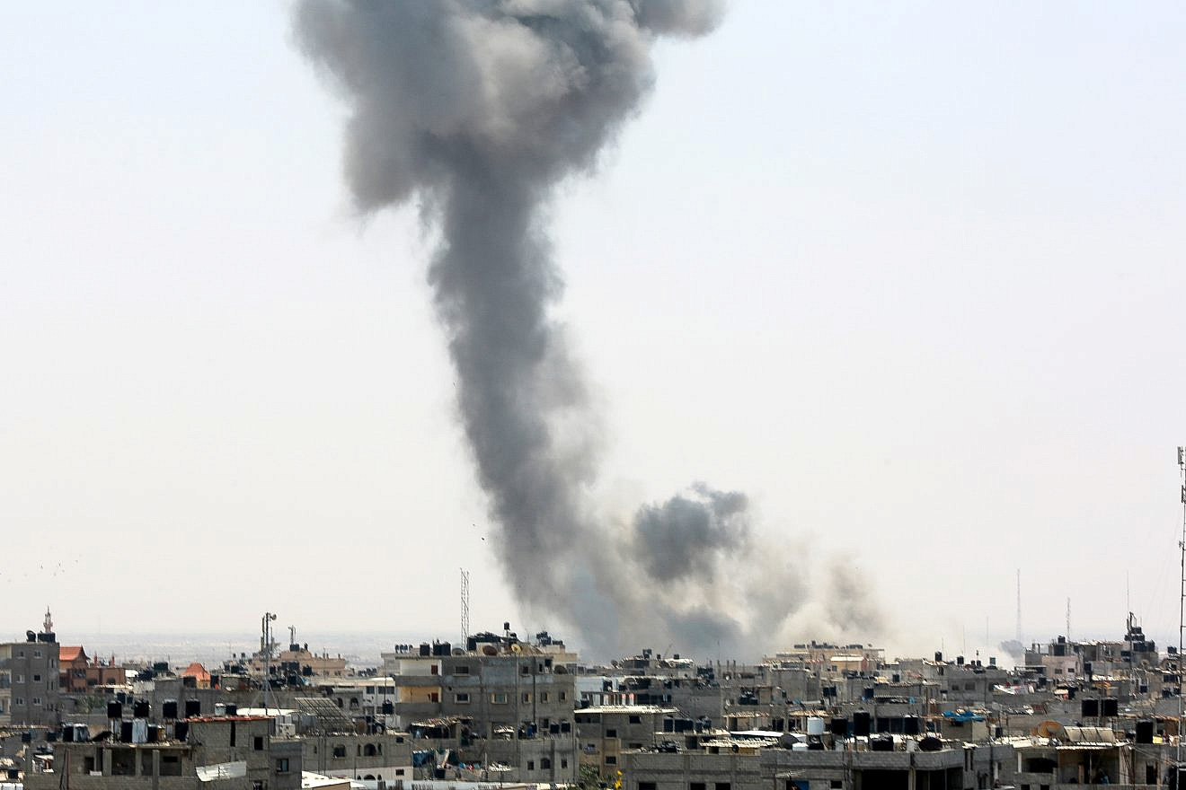 Smoke rises from a location reportedly belonging to Hamas after an Israeli airstrike in the southern Gaza town of Rafah on July 14, 2018. Photo by Abed Rahim Khatib/Flash90.
