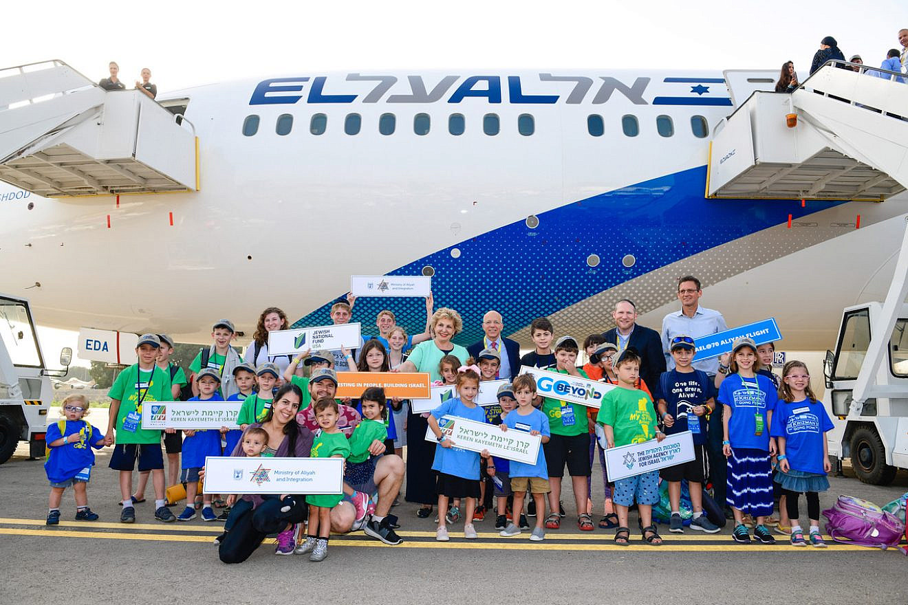 Children land at Ben-Gurion Airport and are greeted by Nefesh B'Nefesh co-founders Rabbi Yehoshua Fass and Tony Gelbart, as well as Israel's Minister of Aliyah and Integration, Sofa Landver. Credit: Photo by Shahar Azran.