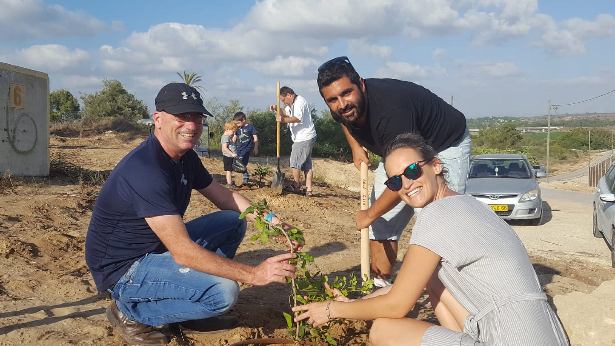 Israelis replant trees after arson attacks from the Gaza Strip in the summer of 2018. Credit: Kibbutz Erez.