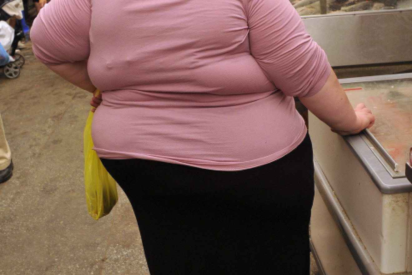 An obese woman in Machane Yehuda market in Jerusalem on Sep. 14. 2010. Photo by Serge Attal/Flash90.