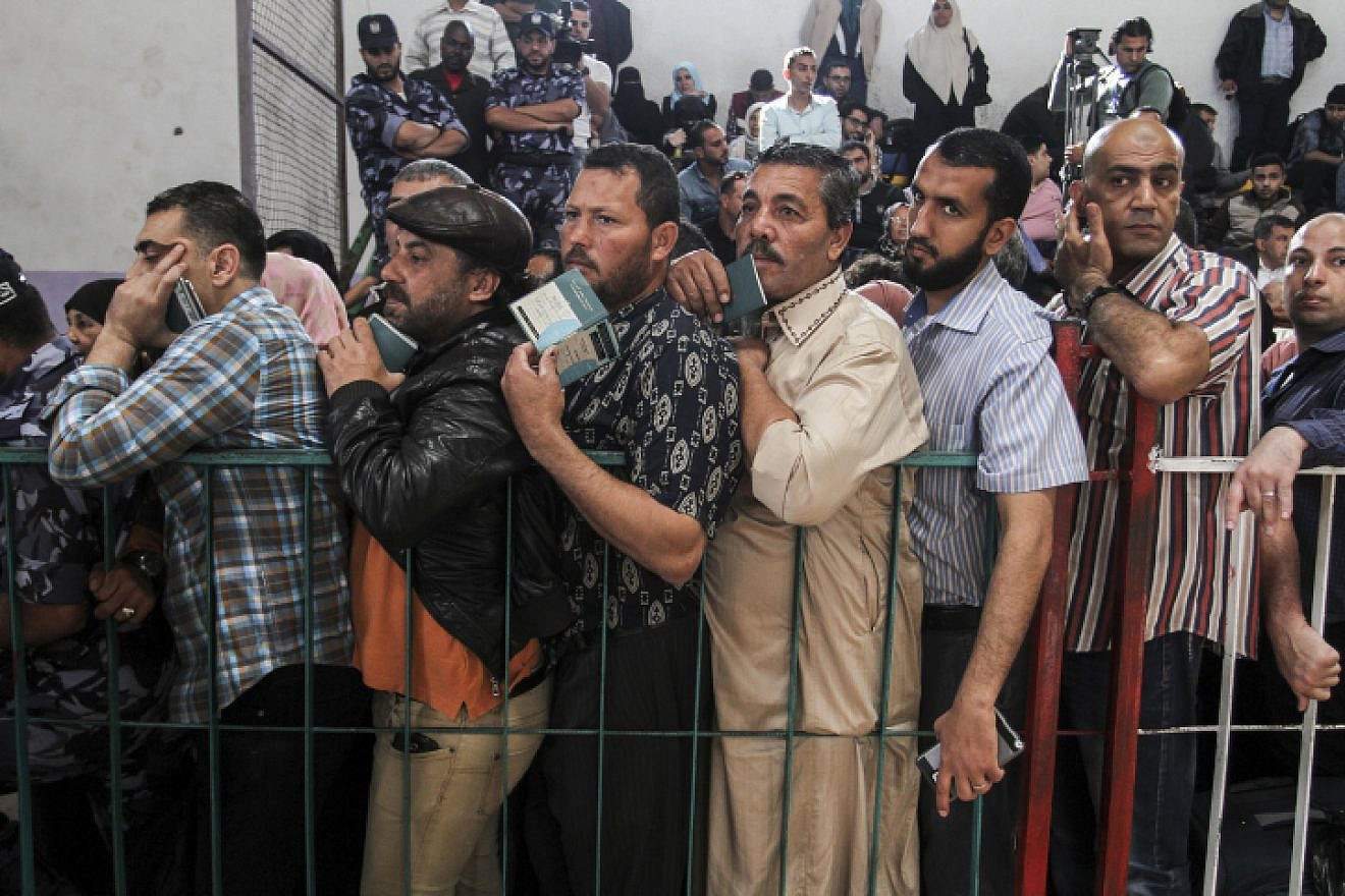 Palestinians wait at the Rafah border crossing with Egypt in the southern Gaza Strip, after it was opened for two days by Egyptian authorities, on May 11, 2016. Photo by Abed Rahim Khatib/Flash90 .