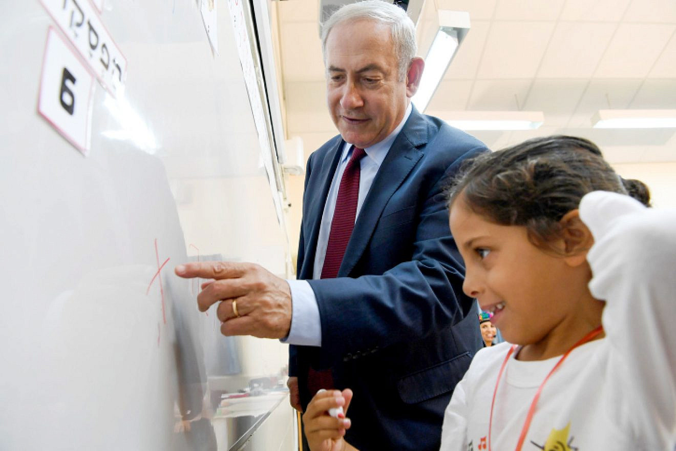 Israeli Prime Minister Benjamin Netanyahu visits children on the first day of school in Yad Binyamin on Sept. 2, 2018. Photo by Avi Ohayon/GPO.
