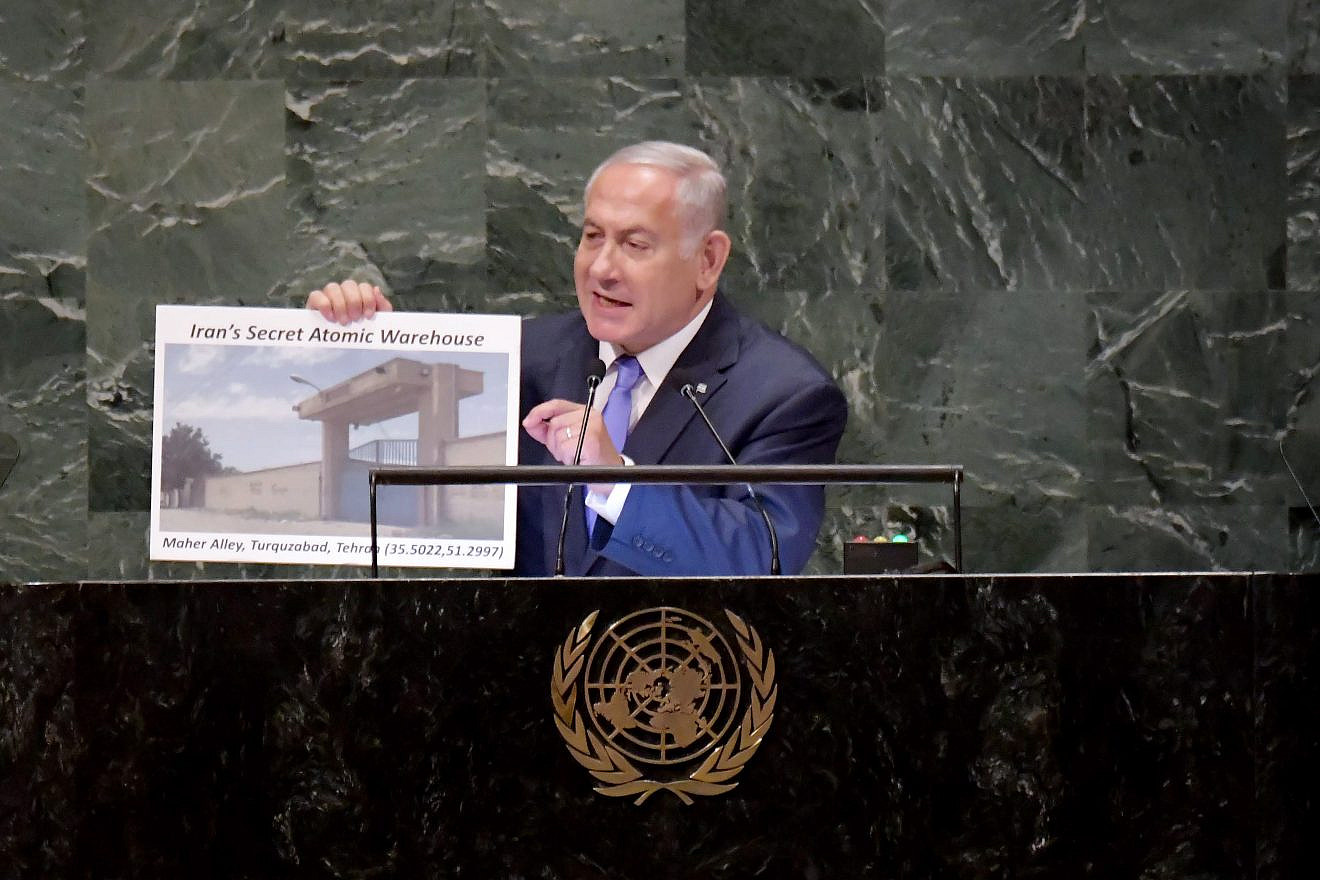 Israeli Prime Minister Benjamin Netanyahu addresses the U.N. General Assembly in New York, visual in hand, revealing a hidden Iranian nuclear facility and secret missiles in Lebanon’s capital, on Sept. 27, 2018. Photo by Avi Ohayon/GPO.