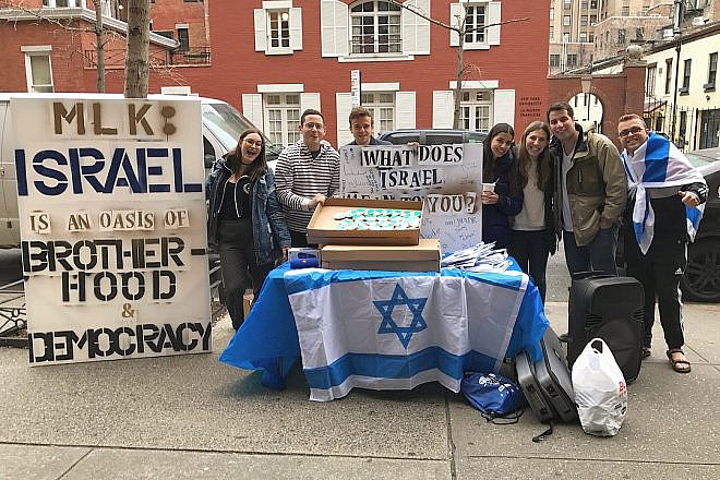 At New York University, pro-Israel students hold a counter-demonstration that raises awareness about Israeli democracy, diversity and other positive attributes of the Jewish state. Encouraging students to publicly counter anti-Israel protests is part of the Maccabee Task Force's strategy of "taking back the quad." Credit: Maccabee Task Force.