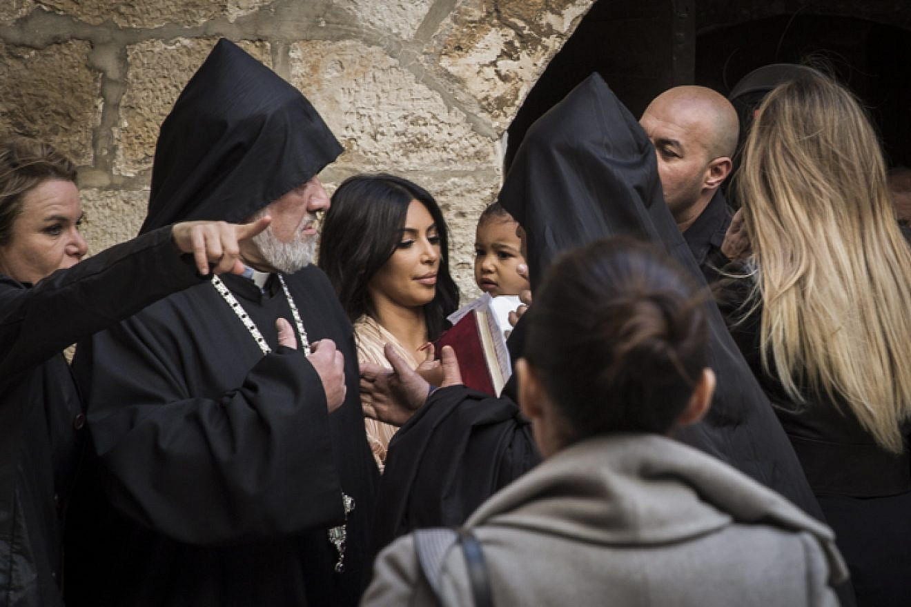 Kim Kardashian, her then-husband Kanye West and their daughter North are greeted by priests at the Saint James Armenian Church in the Armenian Quarter of Jerusalem's Old City, April 13, 2015. Credit: Hadas Parush/Flash90.