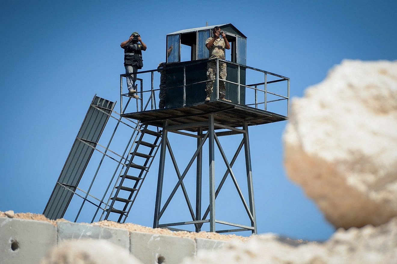 Lebanese soldiers and a member of Hezbollah on the border between Israel and Lebanon on Sept. 5, 2018. Photo by Basel Awidat/Flash90.