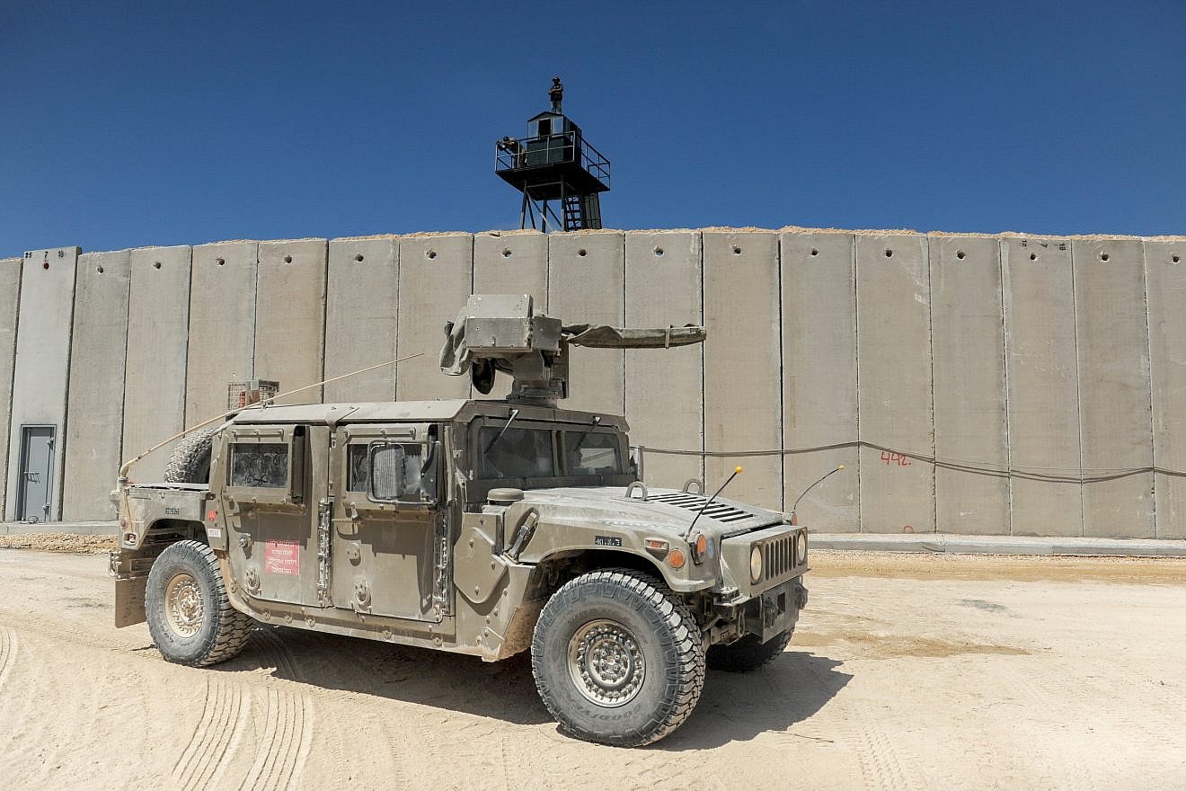 An Israeli army vehicle drives near a new concrete wall near Rosh Hanikra on the Lebanese border, Sept. 5, 2018. Photo by Basel Awidat/Flash90.
