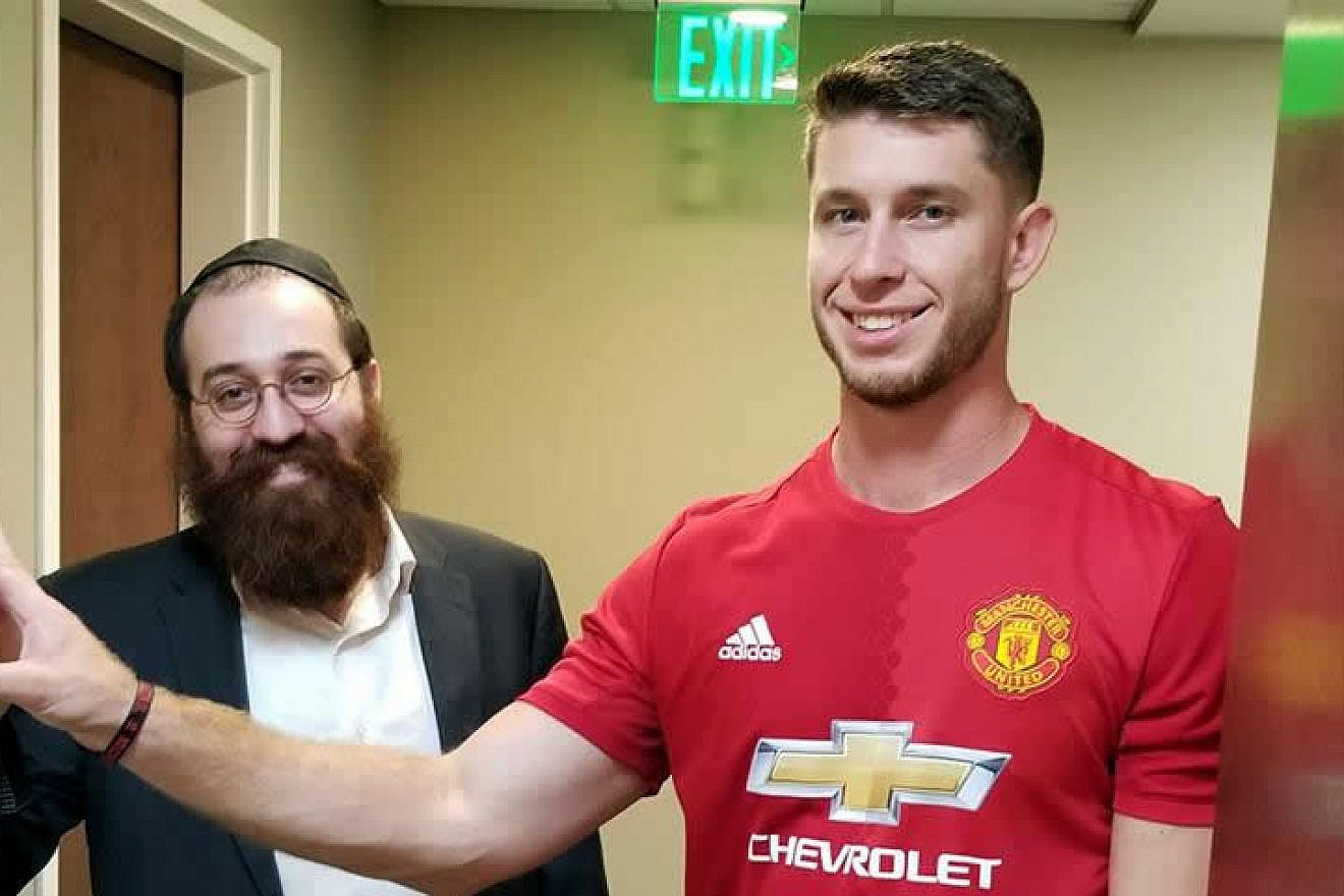 Cleveland Browns placekicker Greg Joseph scored his first game-winning field goal last week with two seconds left in overtime against the Baltimore Ravens. He also made plans to put up a mezuzah at his new home with the help of Chabad Rabbi Yossi Freedman, which they did after the game. Credit: Chabad.org/News.