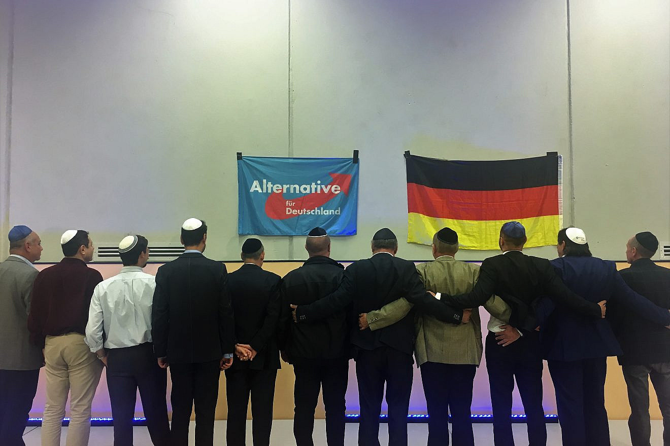 Members of the new Jewish factions for Germany's far-right AfD Party sing the traditional Jewish song "Oseh Shalom" on stage together. Credit: Orit Arfa.
