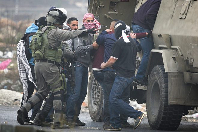 Illustrative: Israeli undercover troops arrest a Palestinian man during a protest in the West Bank City of Ramallah against U.S. President Donald Trump's latest decision to recognize Jerusalem as the capital of Israel, Dec. 13, 2017. Photo by Flash90.