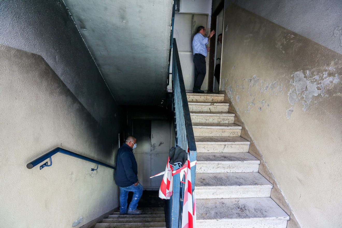 The scene where 19 people were injured  after a fire broke out in the lower floor of an apartment building in the city of Beit Shemesh on Nov. 15, 2018. Photo by Yaakov Lederman/Flash90.