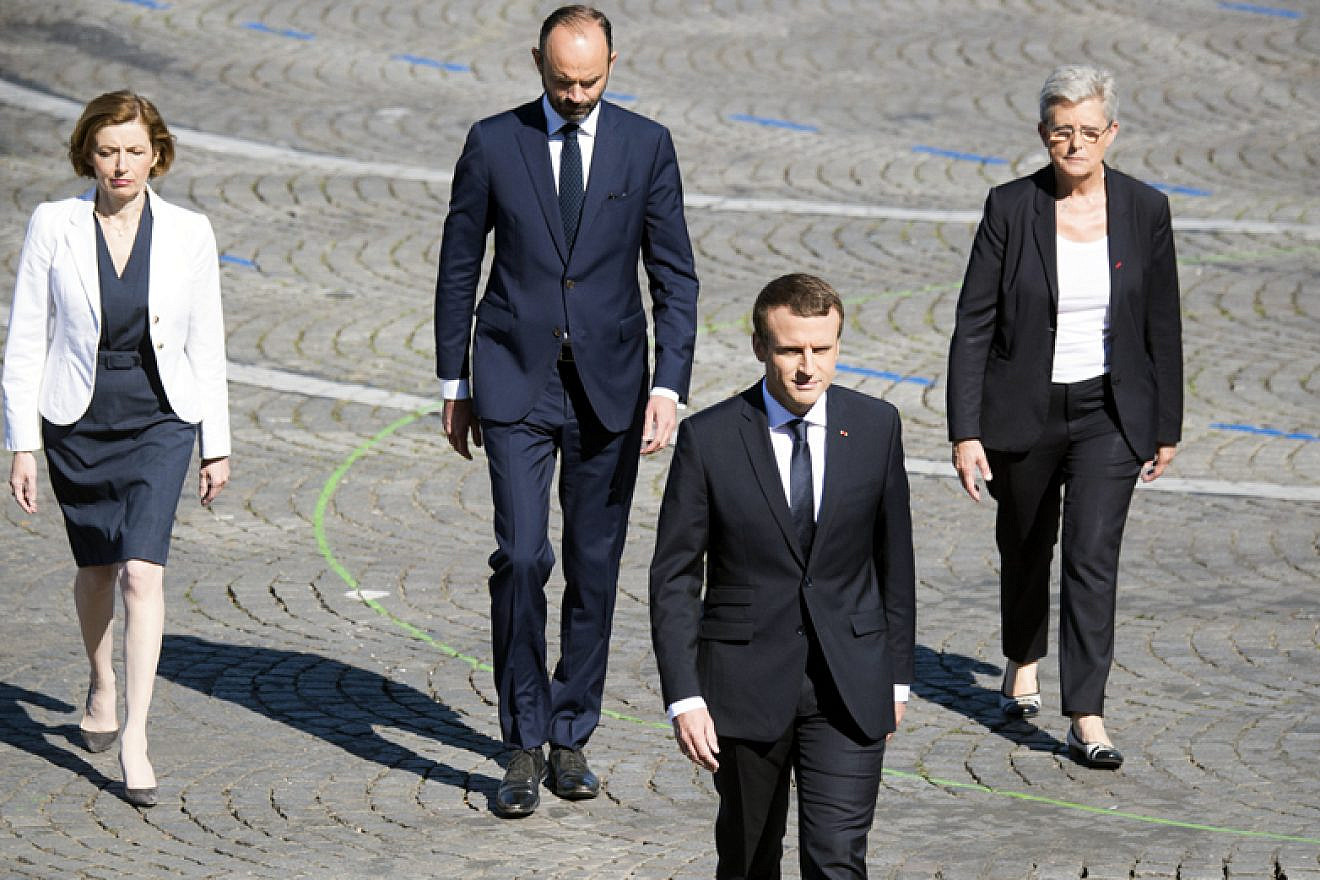 French President Emmanuel Macron heads to the reviewing stand for the annual Bastille Day military parade in Paris on July 14, 2017. Credit: Department of Defense Photo by Navy Petty Officer 2nd Class Dominique Pineiro.