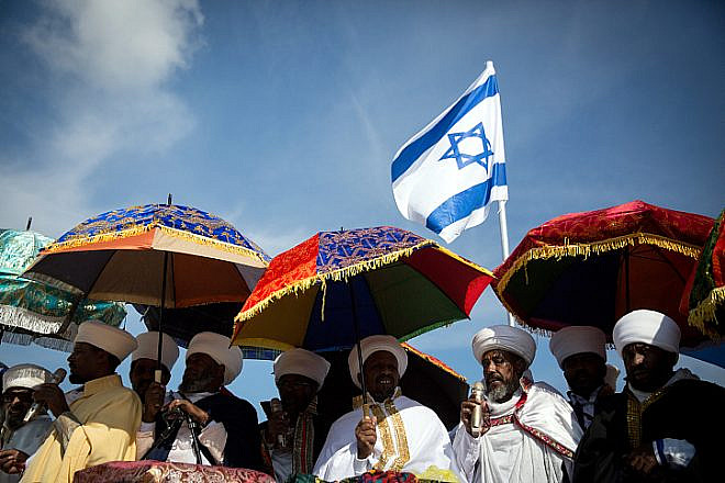 Thousands of Ethiopian Jews take part in a prayer of the Sigd holiday on the Armon Hanatziv Promenade overlooking Jerusalem on Nov. 7, 2018. The prayer is performed by Ethiopian Jews every year to celebrate their community's connection and commitment to Israel. Photo by Hadas Parush/Flash90.