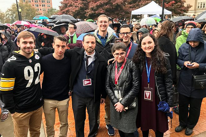 Rabbi Dr. Ari Sytner (center) with community members in Pittsburgh, there to provide comfort after 11 Jewish worshippers were shot and killed by a gunman the Tree of Life*Or L’Simcha Synagogue on Oct. 27, 2018. Credit: Courtesy.
