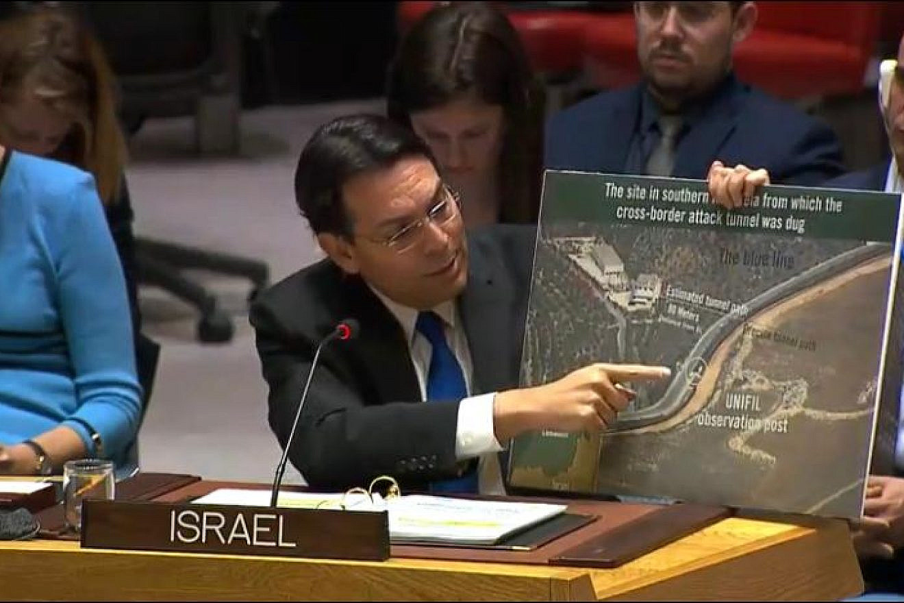 Israeli Ambassador to the United Nations Danny Danon at a special session of the U.N. Security Council on Dec. 19, 2018 shows an aerial photograph of the southern part of Kfar Kila, where an underground terror tunnel crossed the border into Israel. Credit: Permanent Mission of Israel to the United Nations.