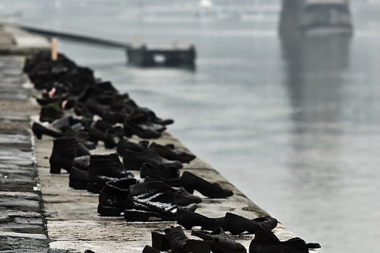 “Shoes on the Danube Promenade” memorial to Hungarian Jews murdered in Budapest during World War II and the Holocaust, erected in 2005 by the Danube River. Credit: Nikodem Nijaki/Wikimedia Commons.