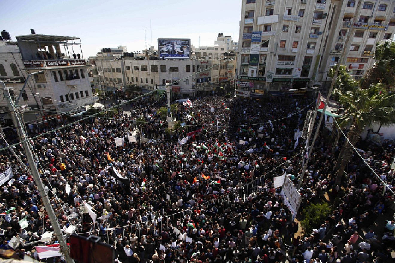 Thousands of Palestinians in Ramallah protest against a social-security law established by the Palestinian Authority that has them concerned over the distribution of funds, Oct. 29, 2018. Photo by Nasser Ishtayeh/Flash90.