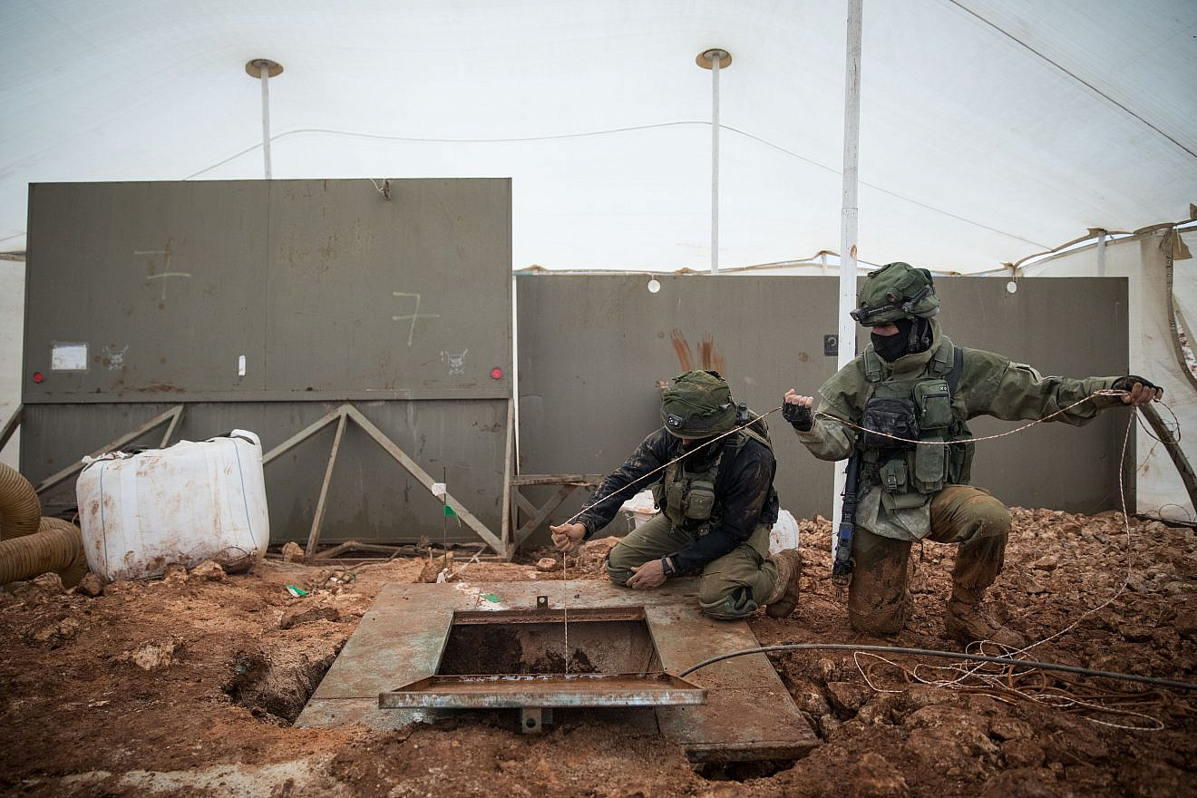 Israeli soldiers stand near a Hezbollah tunnel that crosses from Lebanon to Israel, on the border near Metula in northern Israel, on Dec. 24, 2018. Credit: Hadas Parush/Flash90.