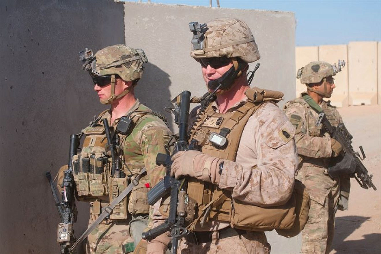 From left: Army 1st Lt. Patrick Abele, 1st Squadron, 75th Cavalry Regiment, Task Force Strike; and Marine Corps Master Sgt. Travis Madden, Special Purpose Marine Air Ground Task Force. Credit: Lt. Daniel Johnson/U.S. Army.