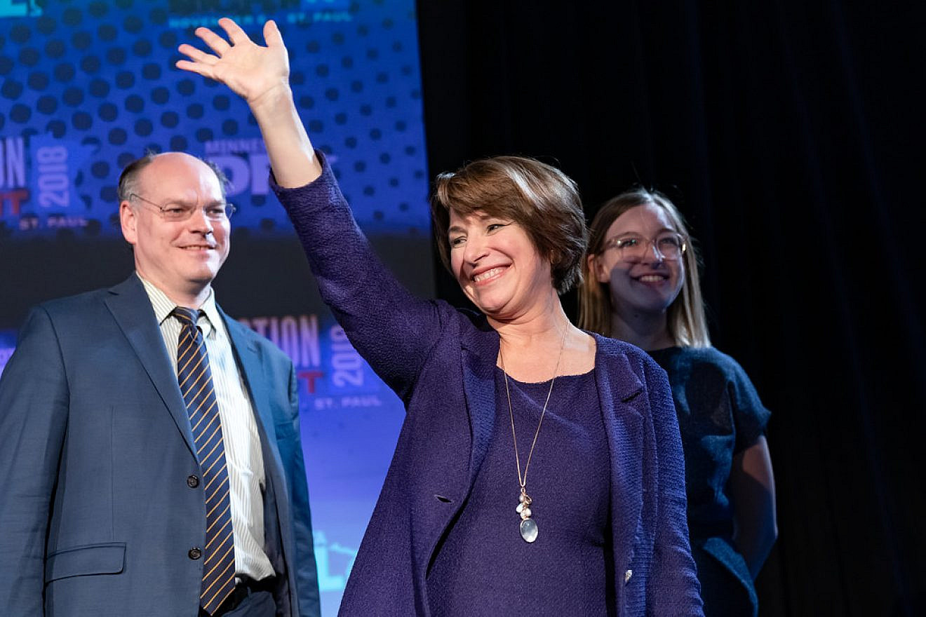 Sen. Amy Klobuchar waves to the crowd at the Minnesota DFL election night party after winning re-election in Nov. 6, 2018, in St. Paul. Credit: Lorie Shaull/Flickr.