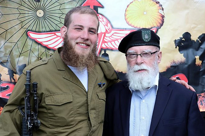 Col. Rabbi Jacob Goldstein, former chief chaplain of the New York Army National Guard, with his grandson, Joe Brickman of Brooklyn, N.Y., who received his red beret from the haredi paratrooper company Chetz on Feb. 21, 2019. Photo by Revah Hafakot.
