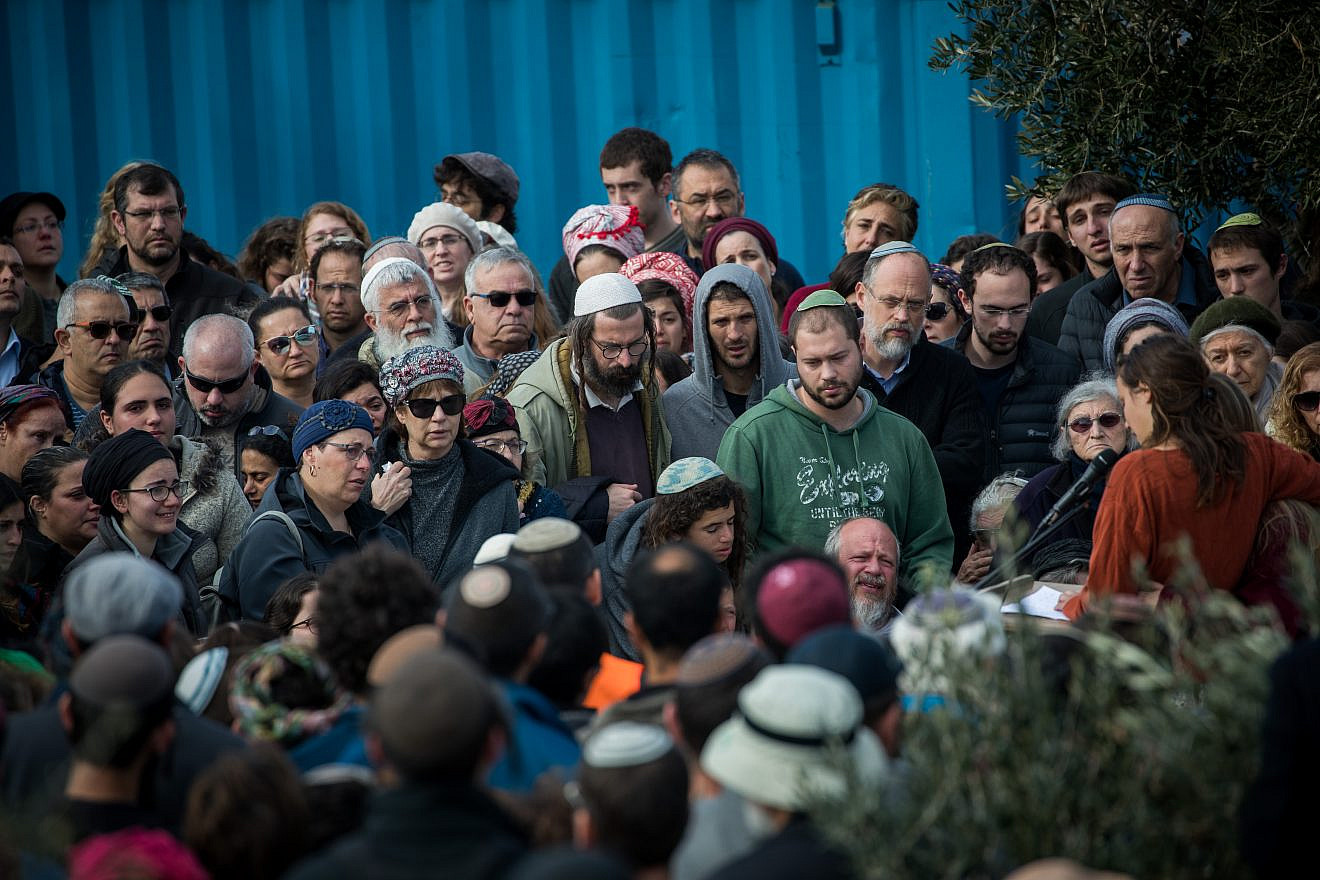 Friends and family members attend the funeral of 19-year-old Ori Ansbacher in the Jewish settlement of Tekoa on Feb. 8, 2019. The young woman was found dead last night in Ein Yael, in the outskirts of Jerusalem, in what police are suspecting is a rape and murder. Credit: Yonatan Sindel/Flash90.