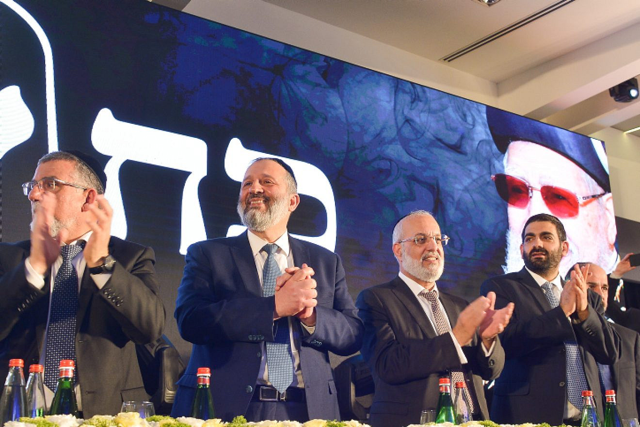 Israeli Minister of Interior Affairs and head of the Shas party Aryeh Deri, seen with Shas parliament members at the campaign opening event in Bat Yam on Feb. 10, 2019. Photo by Yehuda Haim/Flash90.