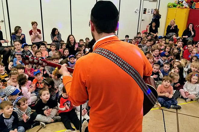 Jake Czuper, aka “Rabbi Jake,” entertains fans at Anshei Lubavitch of Fair Lawn, N.J. Credit: Anshei Lubavitch of Fair Lawn, N.J.