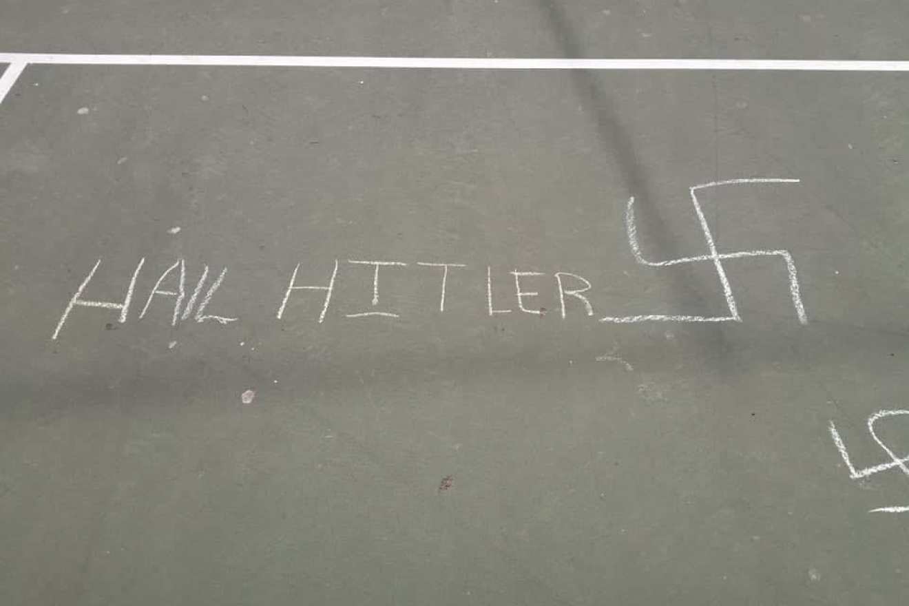 Several swastikas and the words “Hail (sic) Hitler” were discovered at Public School 139 Rego Park’s playground in Queens, N.Y., on Feb. 22, 2019. Source: Twitter/Jewish Journal.