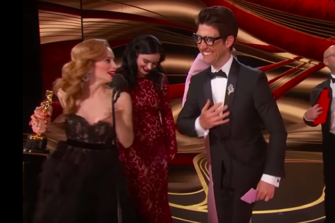 Director Guy Nattiv and his wife, film producer Jaime Ray Newman, accept the Academy Award for Best Short Film for "Skin," Feb. 24, 2019. Source: Screenshot