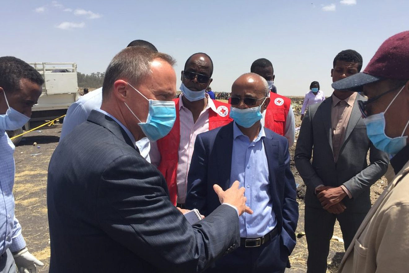 U.S. Ambassador Mike Raynor from the U.S. Embassy in Ethiopia at the crash site of Ethiopian Airlines Flight 302 on March 10, 2019. A team of experts from the U.S. National Transportation Safety Board and the Federal Aviation Administration arrived in Ethiopia to help with the investigatio, as have a forensics team from Israel to search for the remains of two Israelis who died in the crash. Credit: U.S. Embassy in Ethiopia.