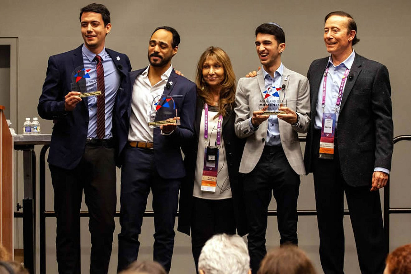 Students from Baruch College in New York, who won the grand prize inn the second annual Innovation Competition for their project, “Brave,” with Adam and Gila Milstein. Credit: Courtesy of Adam and Gila Milstein Family Foundation.
