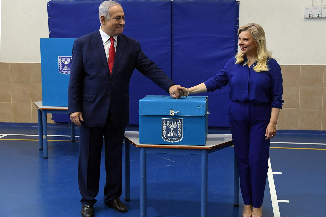 Israeli Prime Minister Benjamin Netanyahu and his wife, Sara, cast their vote at a polling station in Jerusalem during the Knesset Elections, on April 9, 2019. Credit: Haim Zach/GPO.